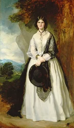 Jeune femme en robe blanche contre un paysage